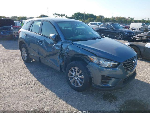  Salvage Mazda Cx